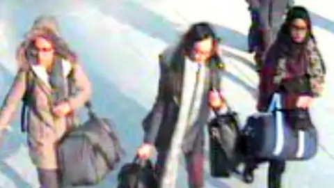 Metropolitan Police Begum (right) as she left London for Syria with two friends