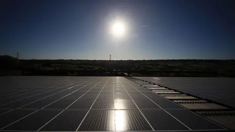 Getty Images Solar panels at Worthy Farm, Somerset