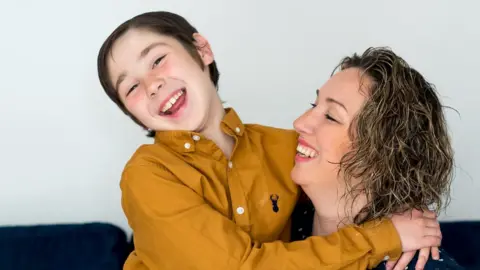 Gavin Dickson/Be Bold PR Zac Oliver and his mother Hannah Oliver-Willets