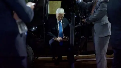 BBC Vice-President Mike Pence retreats to a loading dock at the Capitol during the riot