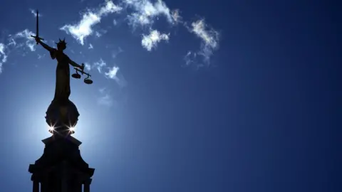 Getty Images The Old Bailey scales of justice