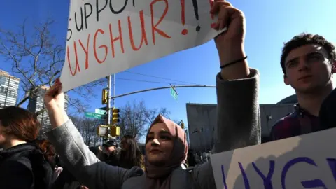 Getty Images Uighur protesters demonstrating in the US in February