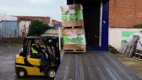 forklift loading equipment on lorry