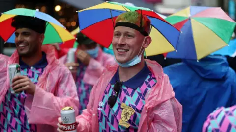 PA Media fans in Leicester Square on Friday