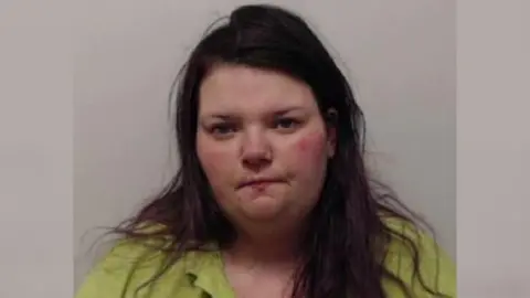 Police Scotland A police mugshot of Moore's former girlfriend Julie McQuade