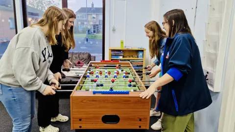 BBC Young people playing table football
