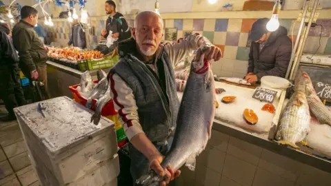 Getty Images People do shopping during the first day of holy Islamic fasting month of Ramadan at central market area in Tunis, Tunisia on April 02, 2022