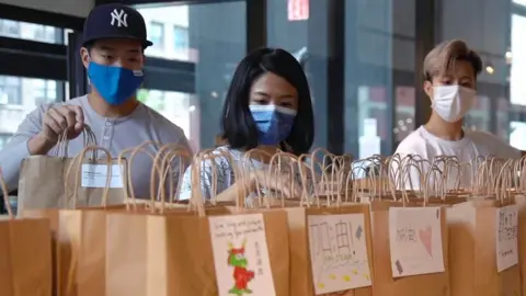 Volunteers with food