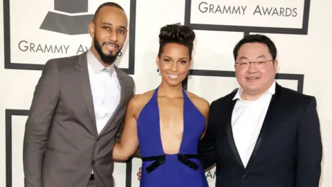 Getty Images Swizz Beatz, Alicia Keys and Jho Low