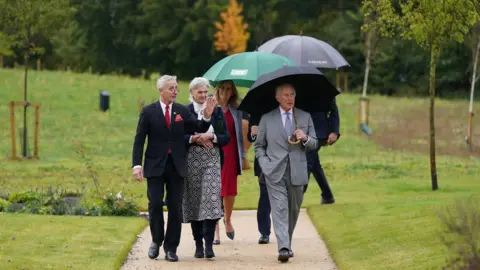 Jacob King/PA Wire The King visits the therapy garden