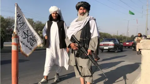 Reuters Taliban fighetsrs in Mazar-i-Sharif