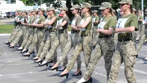 Ukraine defence ministry Female soldiers in Ukraine marching in high heels