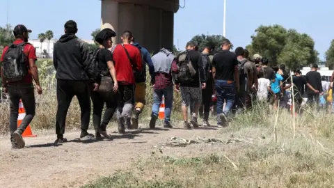 Reuters Migrants near Eagle Pass on 21 September