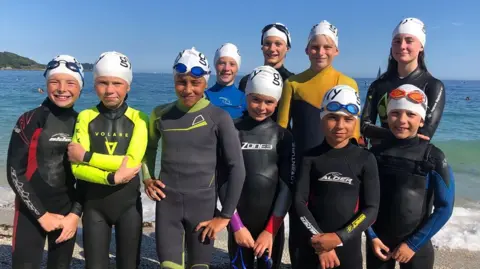 Children in Falmouth are learning life-saving skills in the sea but their local pool has shut.