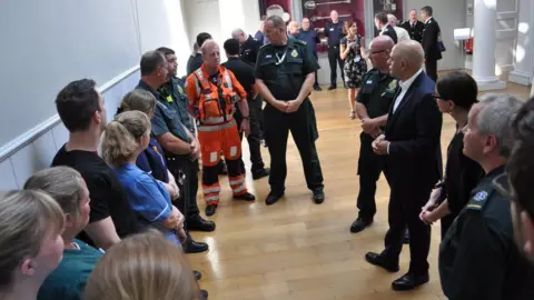 EPA/Salisbury NHS Foundation Trust Sajid Javid meets emergency personnel