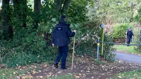 Officers searching local hedgerows