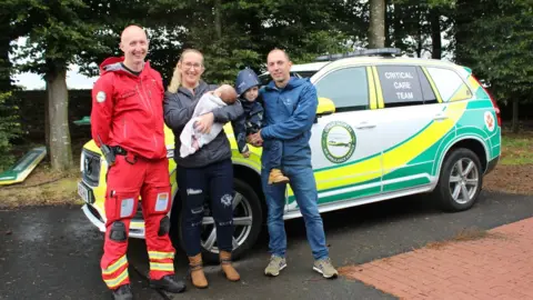 GNAAS Dr Lyle Moncur, Naomi, Maisie, Max and Rich Clague with the rapid response vehicle