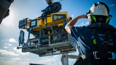 Schmidt Ocean Institute The remotely operated vehicle SuBastian is moved into position on the research vessel