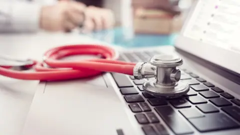 Getty Images Stethoscope on a laptop