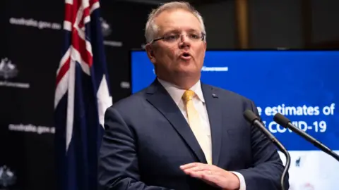 Getty Images Australian Prime Minister Scott Morrison speaks at a press conference after discussing plans for a Trans-Tasman travel agreement.