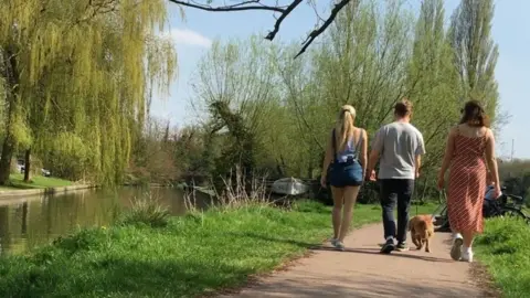 Cambridge University Students walking Jack the dog