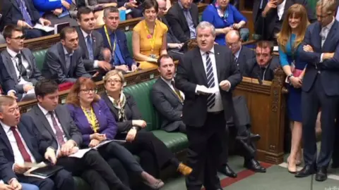 PA Ian Blackford and SNP MPs