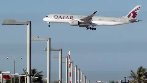 Reuters Qatar Airways aircraft over Doha