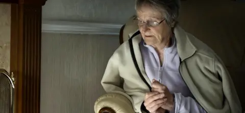 Getty Images pensioner keeping warm at home