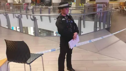 Essex Police A police officer at Lakeside shopping centre in Thurrock