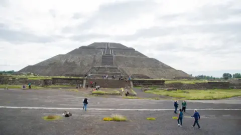 AFP Tourists visit the archaeological site of Teotihuacan, one of Mexico's top tourist attractions, during its reopening amid the COVID-19 novel coronavirus pandemic on September 10, 2020
