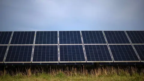 BEN STANSALL/AFP A solar farm