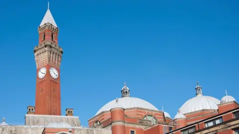 What is the point of a clock tower?