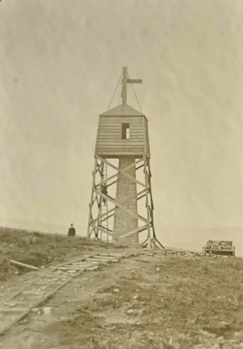 Scottish Water siteline worker showing one of many observatories which were constructed along the route of the aqueduct which were up to about 60ft high and were used by workers operating theodolite-like devices to measure and check the route of the aqueduct