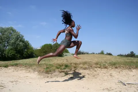 Tom Jacobs / Reuters Team GB athlete Desiree Henry trains at a golf course in Edmonton, London