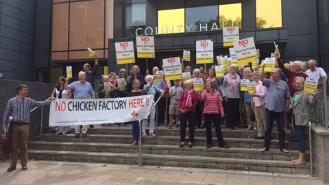 BBC Campaigners against the chicken factory outside the planning meeting in Trowbridge