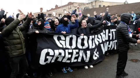 Reuters Rangers fans with banner