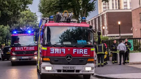 Graham Eva Fire crews on a watching brief at the Chalcots state