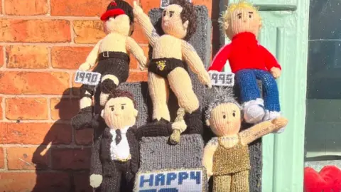 Syston Knitting banxy Knitted models of Robbie Williams