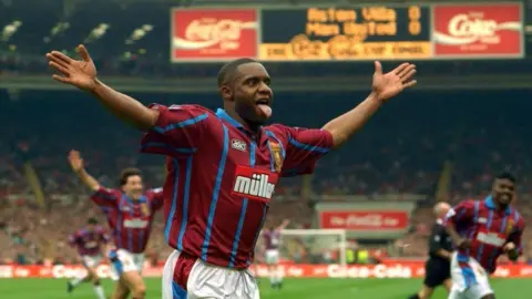 Reuters Dalian Atkinson celebrates scoring for Aston Villa against Manchester United in the 1994 League Cup final