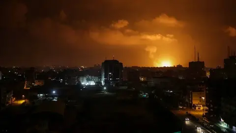 EPA Smoke rises after an Israeli air strike in Gaza City on 15 March 2019