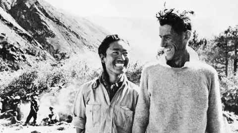 Getty Images Smiling victors Sherpa Tenzing (Left) and Edmund Hillary at their camp after their return from Everest.