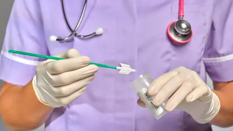 Getty Images Practice Nurse/doctor doing smear test