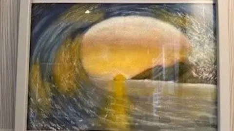 Blind Veterans UK A photograph of a painting in a photoframe