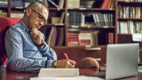 Getty Images Checking finances