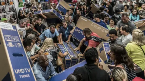 Getty Images Shoppers at a Black Friday shopping event in Sao Paulo, Brazil, in November 2018