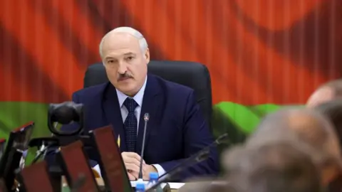 Getty Images President Alexander Lukashenko holds a meeting in the Strategic Management Centre of the Belarusian Defence Ministry