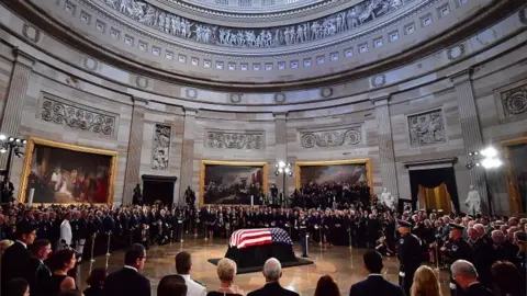 EPA Former Senator John McCain lies in state in the Capitol Rotunda at the US Capitol in Washington DC on 31 August 2018