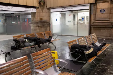 Reuters People sleeping at Edinburgh Waverley