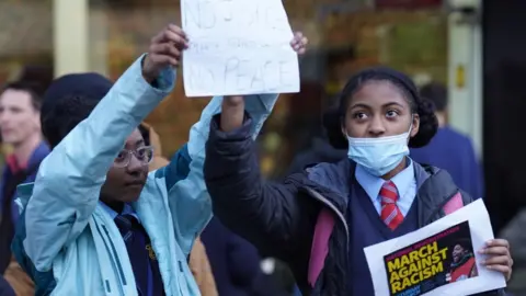 PA Media Schoolchildren protesting against the treatment of Child Q