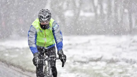 Ed Smith/Comic Relief Ltd Greg James cycling in the snow